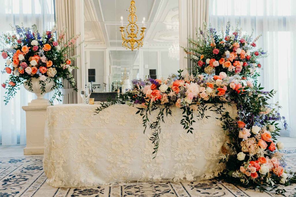 Head Table at Hotel Carmichael Covered In Beautiful Colorful Florals