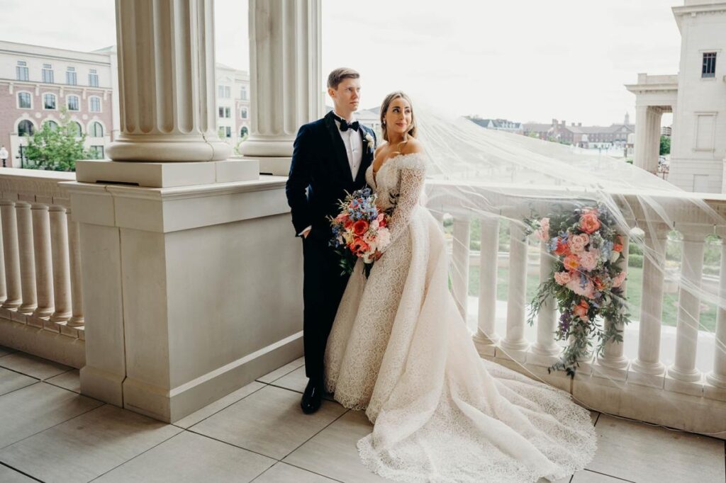 Bride and Groom Hotel Carmichael Outside Balcony revealing downtown Carmel, Indiana