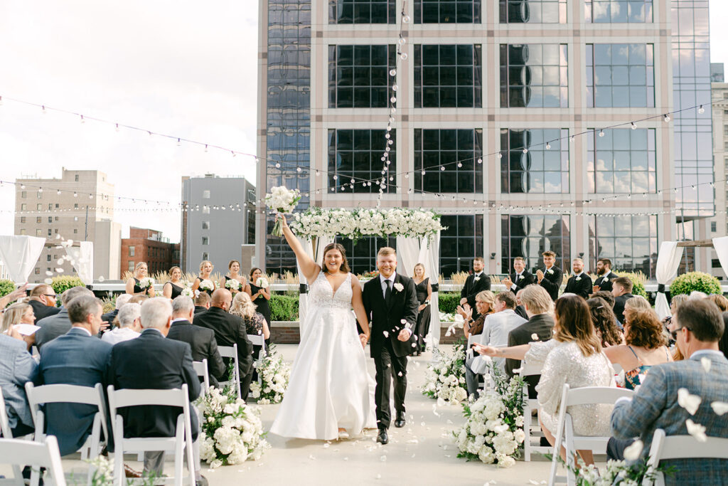 Bride and groom celebrate regions tower wedding ceremony.