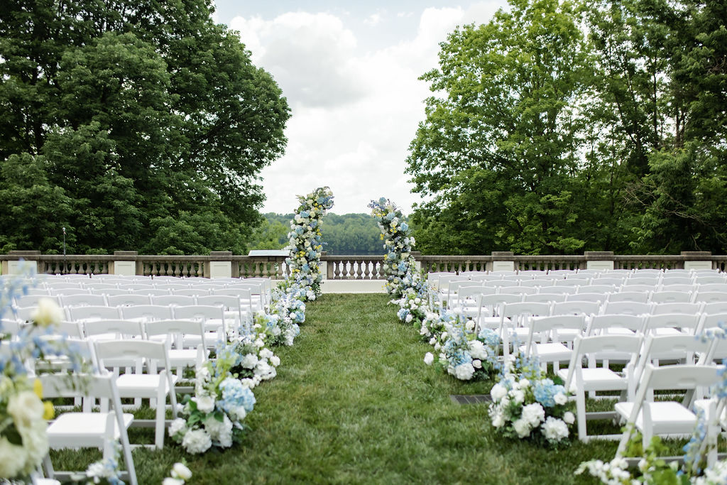 aisle decorated with beautiful florals by I Do Florals By Sarah at newfields indianapolis