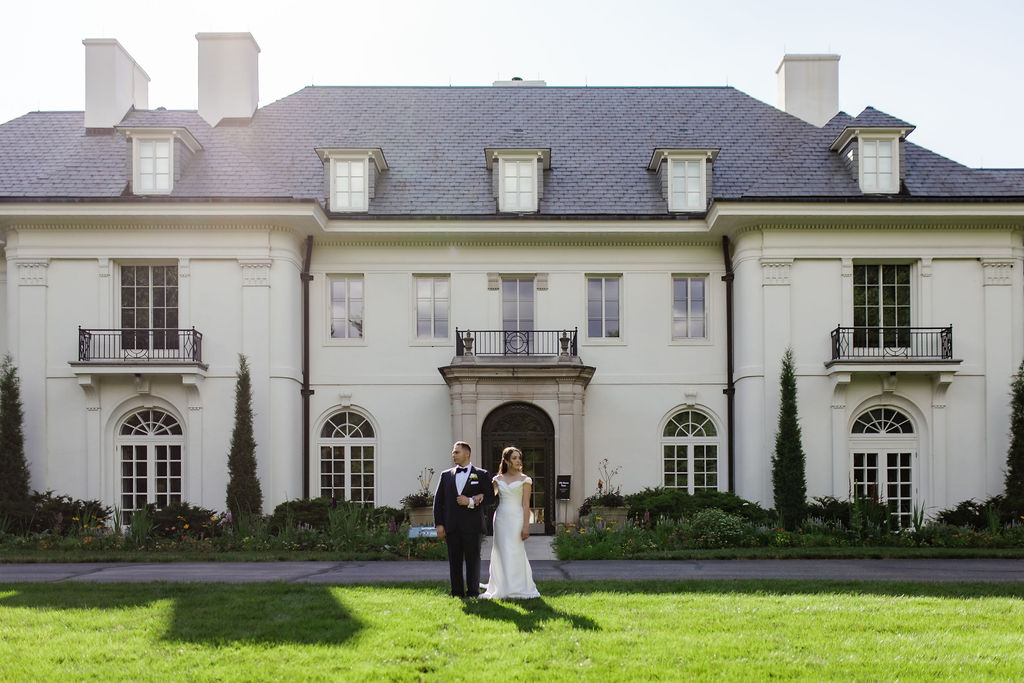 Wedding couple standing in front of Newfields Lilly House Indianapolis Indiana Wedding