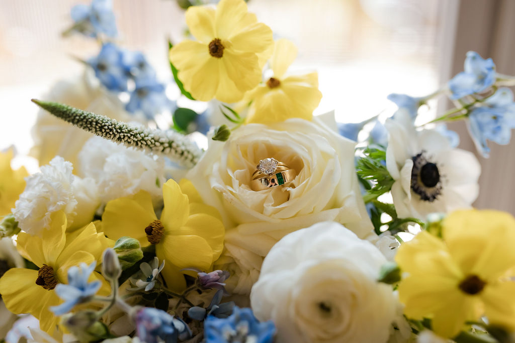bridal rings in a beautiful boque of flowers