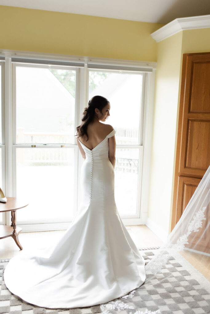 back of a beautiful bride's wedding dress in indianapolis