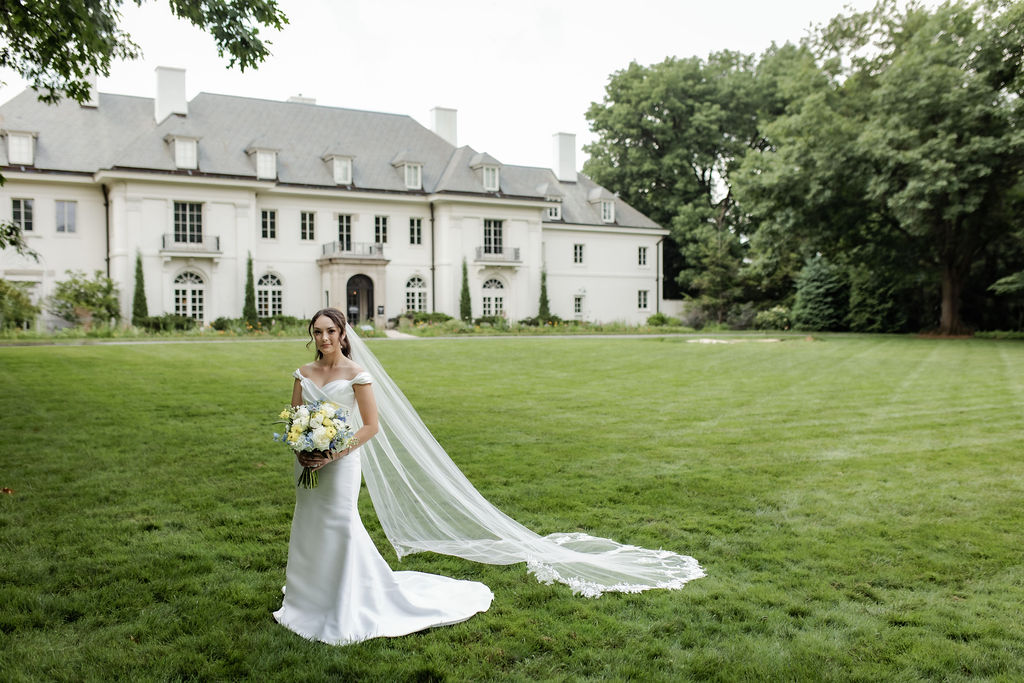 Bride posing in front of Lilly House in Indianapolis.