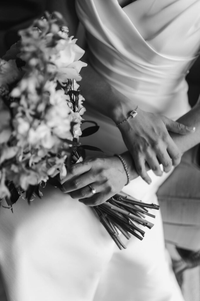 Close up detail shot by Natalie Marie Photo of bride's jewelry.