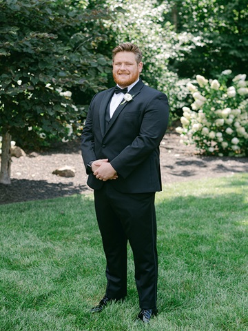 Groom posing at Barn at Bay Horse Inn greenwood Indiana