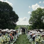 Newfields wedding ceremony outside at the lilly house terrace.