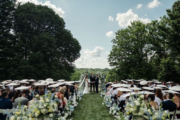 Newfields wedding ceremony outside at the lilly house terrace.