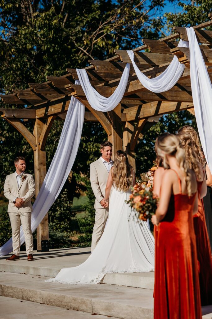 Groom outside wedding ceremony.
