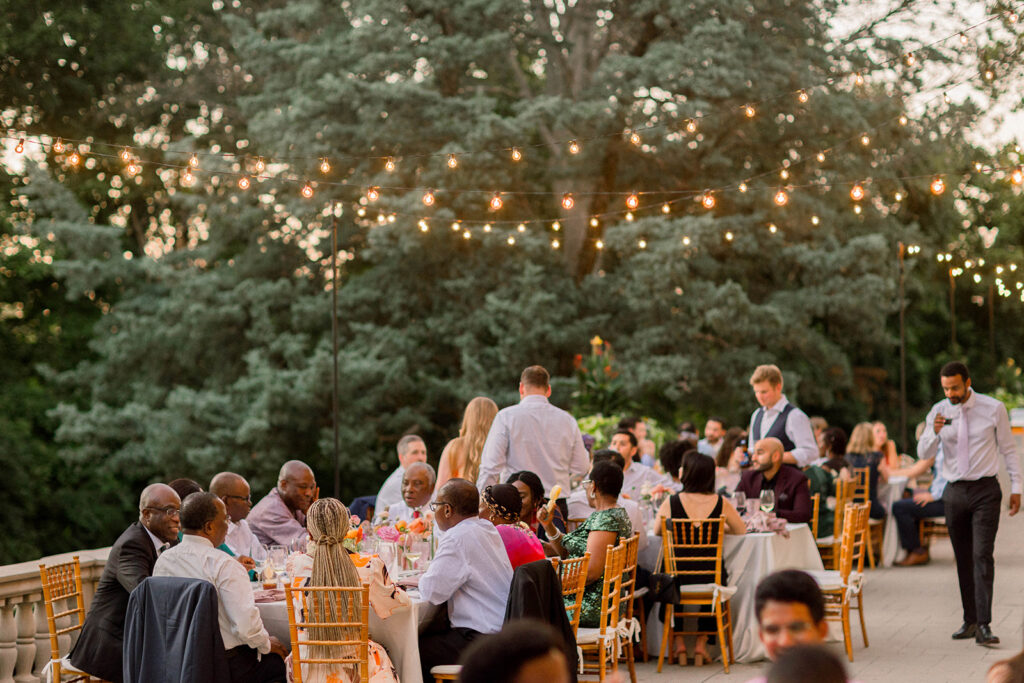 Sunset patio at Laurel Hall with string lights.