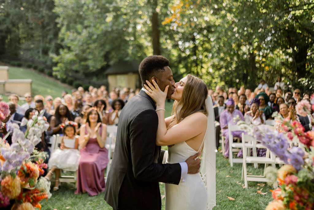 Bride and Groom first kiss at Laurel Hall Outside ceremony.